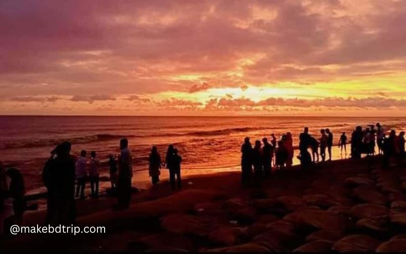visitors are enjoying sunset at kuakata sea beach